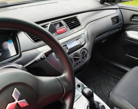 Мицубиси Лансер 2008 в Белой Церкве на Automoto.ua Синий Мицубиси Лансер, объемом двигателя 1.6 л и пробегом 243 тыс. км за 4200 $, фото 10 на Automoto.ua