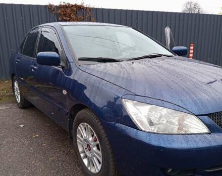 Синій Міцубісі Lancer, об'ємом двигуна 1.6 л та пробігом 206 тис. км за 5500 $, фото 8 на Automoto.ua