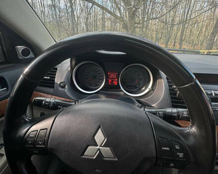 Синий Мицубиси Лансер, объемом двигателя 1.5 л и пробегом 250 тыс. км за 5150 $, фото 8 на Automoto.ua