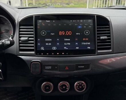 Синий Мицубиси Лансер, объемом двигателя 2 л и пробегом 186 тыс. км за 7200 $, фото 6 на Automoto.ua