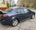 Синий Мицубиси Лансер, объемом двигателя 2 л и пробегом 205 тыс. км за 5899 $, фото 5 на Automoto.ua
