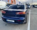 Синий Мицубиси Лансер, объемом двигателя 1.5 л и пробегом 247 тыс. км за 5000 $, фото 2 на Automoto.ua