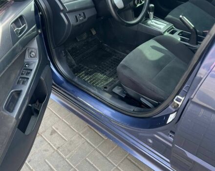 Синій Міцубісі Lancer, об'ємом двигуна 1.5 л та пробігом 213 тис. км за 5350 $, фото 4 на Automoto.ua