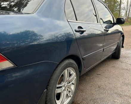 Синий Мицубиси Лансер, объемом двигателя 1.6 л и пробегом 150 тыс. км за 5700 $, фото 55 на Automoto.ua