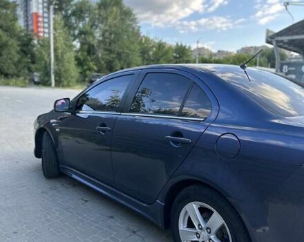 Синий Мицубиси Лансер, объемом двигателя 1.97 л и пробегом 260 тыс. км за 6000 $, фото 2 на Automoto.ua