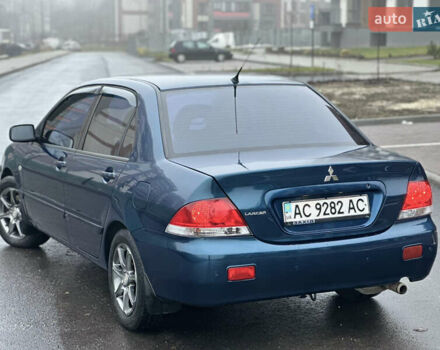 Синий Мицубиси Лансер, объемом двигателя 1.6 л и пробегом 187 тыс. км за 3799 $, фото 12 на Automoto.ua