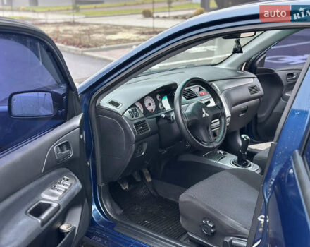 Синий Мицубиси Лансер, объемом двигателя 1.6 л и пробегом 187 тыс. км за 3799 $, фото 15 на Automoto.ua