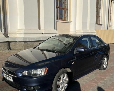 Синий Мицубиси Лансер, объемом двигателя 2 л и пробегом 3 тыс. км за 4200 $, фото 3 на Automoto.ua