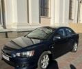 Синий Мицубиси Лансер, объемом двигателя 2 л и пробегом 3 тыс. км за 4200 $, фото 3 на Automoto.ua