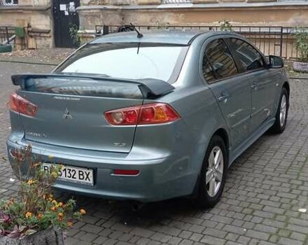 Синий Мицубиси Лансер, объемом двигателя 2 л и пробегом 300 тыс. км за 6900 $, фото 7 на Automoto.ua