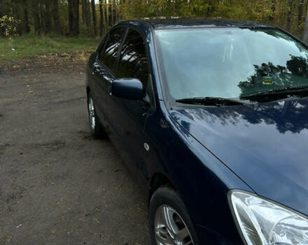 Синий Мицубиси Лансер, объемом двигателя 1.6 л и пробегом 150 тыс. км за 5700 $, фото 56 на Automoto.ua