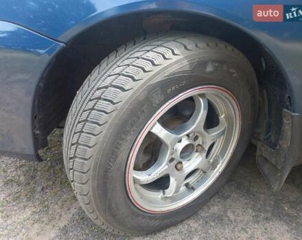 Синій Міцубісі Lancer, об'ємом двигуна 1.6 л та пробігом 275 тис. км за 5100 $, фото 13 на Automoto.ua