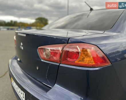 Міцубісі Lancer 2008 у Києві на Automoto.ua Синій Міцубісі Lancer, об'ємом двигуна 2 л та пробігом 265 тис. км за 6250 $, фото 20 на Automoto.ua