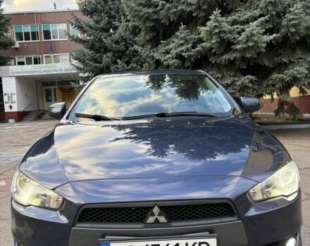 Синий Мицубиси Лансер, объемом двигателя 2 л и пробегом 205 тыс. км за 5899 $, фото 1 на Automoto.ua