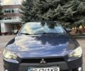 Синий Мицубиси Лансер, объемом двигателя 2 л и пробегом 205 тыс. км за 5899 $, фото 1 на Automoto.ua