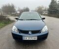 Синій Міцубісі Lancer, об'ємом двигуна 1.6 л та пробігом 126 тис. км за 5950 $, фото 1 на Automoto.ua