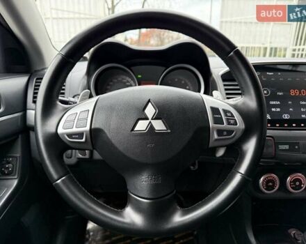 Синий Мицубиси Лансер, объемом двигателя 2 л и пробегом 186 тыс. км за 7200 $, фото 7 на Automoto.ua