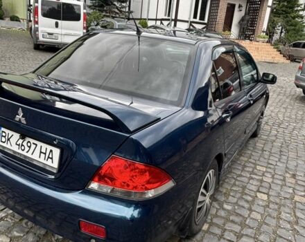 Міцубісі Lancer 2008 у Рівному на Automoto.ua Синій Міцубісі Lancer, об'ємом двигуна 1.6 л та пробігом 158 тис. км за 3900 $, фото 5 на Automoto.ua