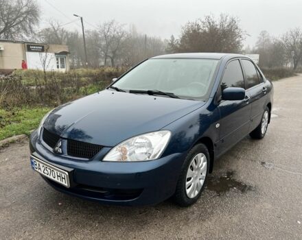 Синій Міцубісі Lancer, об'ємом двигуна 1.6 л та пробігом 126 тис. км за 5950 $, фото 2 на Automoto.ua