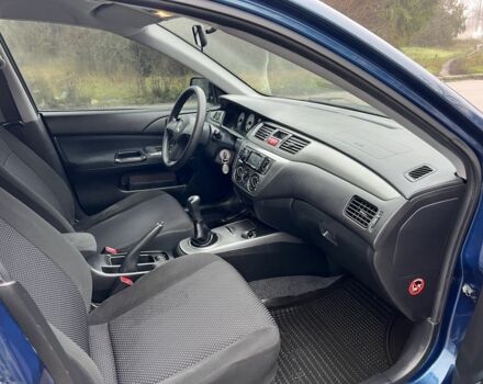 Синій Міцубісі Lancer, об'ємом двигуна 1.6 л та пробігом 126 тис. км за 5950 $, фото 11 на Automoto.ua