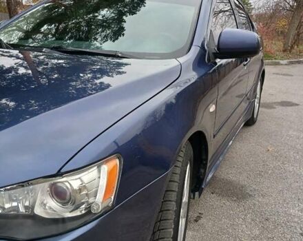 Синий Мицубиси Лансер, объемом двигателя 1.5 л и пробегом 220 тыс. км за 6999 $, фото 27 на Automoto.ua