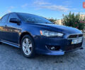 Синій Міцубісі Lancer, об'ємом двигуна 2 л та пробігом 250 тис. км за 5800 $, фото 1 на Automoto.ua
