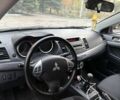 Синий Мицубиси Лансер, объемом двигателя 2 л и пробегом 205 тыс. км за 5899 $, фото 14 на Automoto.ua