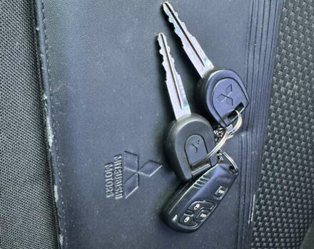 Синий Мицубиси Лансер, объемом двигателя 1.6 л и пробегом 187 тыс. км за 3799 $, фото 22 на Automoto.ua