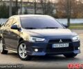 Синій Міцубісі Lancer, об'ємом двигуна 2 л та пробігом 218 тис. км за 7450 $, фото 1 на Automoto.ua
