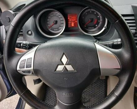 Синий Мицубиси Лансер, объемом двигателя 1.5 л и пробегом 220 тыс. км за 6999 $, фото 16 на Automoto.ua