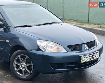 Синий Мицубиси Лансер, объемом двигателя 1.6 л и пробегом 187 тыс. км за 3799 $, фото 10 на Automoto.ua
