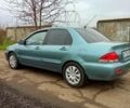 Синій Міцубісі Lancer, об'ємом двигуна 1.6 л та пробігом 167 тис. км за 4700 $, фото 3 на Automoto.ua