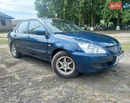Синій Міцубісі Lancer, об'ємом двигуна 1.6 л та пробігом 275 тис. км за 5100 $, фото 4 на Automoto.ua
