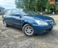 Синій Міцубісі Lancer, об'ємом двигуна 1.6 л та пробігом 275 тис. км за 5100 $, фото 4 на Automoto.ua