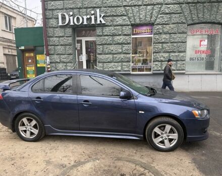 Синий Мицубиси Лансер, объемом двигателя 2 л и пробегом 200 тыс. км за 6700 $, фото 3 на Automoto.ua