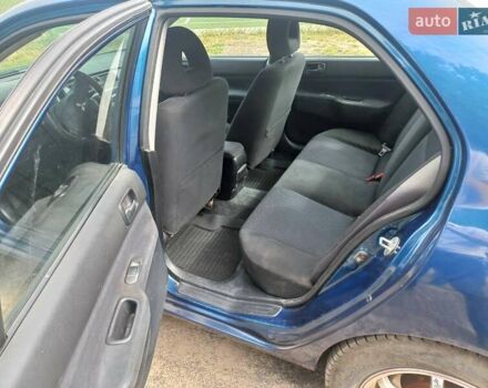 Синій Міцубісі Lancer, об'ємом двигуна 1.6 л та пробігом 275 тис. км за 5100 $, фото 9 на Automoto.ua