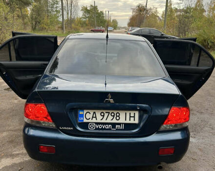 Синий Мицубиси Лансер, объемом двигателя 1.6 л и пробегом 150 тыс. км за 5700 $, фото 34 на Automoto.ua
