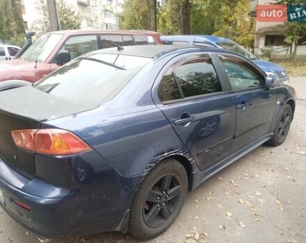 Синій Міцубісі Lancer, об'ємом двигуна 2 л та пробігом 265 тис. км за 5700 $, фото 1 на Automoto.ua