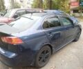 Синій Міцубісі Lancer, об'ємом двигуна 2 л та пробігом 265 тис. км за 5700 $, фото 1 на Automoto.ua