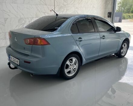 Синий Мицубиси Лансер, объемом двигателя 1.5 л и пробегом 261 тыс. км за 5500 $, фото 5 на Automoto.ua