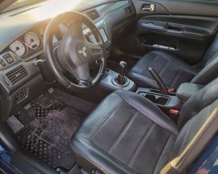 Синий Мицубиси Лансер, объемом двигателя 1.6 л и пробегом 197 тыс. км за 6500 $, фото 9 на Automoto.ua