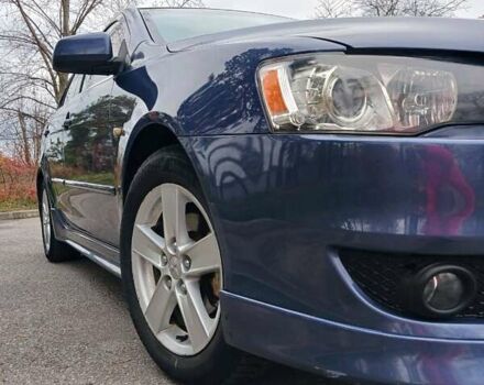 Синий Мицубиси Лансер, объемом двигателя 1.5 л и пробегом 220 тыс. км за 6999 $, фото 24 на Automoto.ua