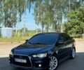 Синий Мицубиси Лансер, объемом двигателя 2 л и пробегом 250 тыс. км за 6300 $, фото 1 на Automoto.ua