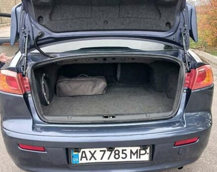 Синий Мицубиси Лансер, объемом двигателя 1.5 л и пробегом 220 тыс. км за 6999 $, фото 12 на Automoto.ua