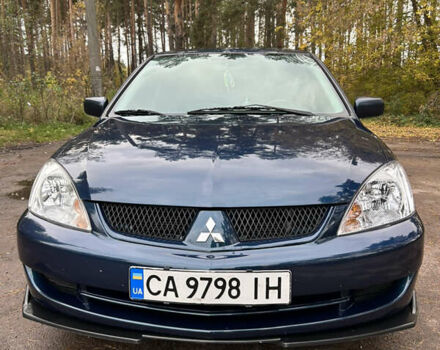 Синий Мицубиси Лансер, объемом двигателя 1.6 л и пробегом 150 тыс. км за 5700 $, фото 10 на Automoto.ua