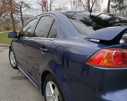 Синий Мицубиси Лансер, объемом двигателя 1.5 л и пробегом 220 тыс. км за 6999 $, фото 29 на Automoto.ua