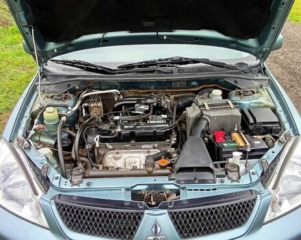 Синій Міцубісі Lancer, об'ємом двигуна 1.6 л та пробігом 167 тис. км за 4700 $, фото 9 на Automoto.ua