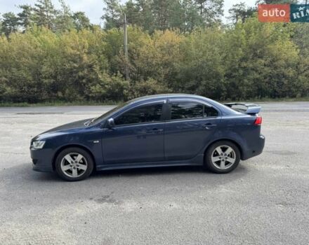 Синій Міцубісі Lancer, об'ємом двигуна 2 л та пробігом 300 тис. км за 5800 $, фото 3 на Automoto.ua