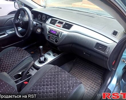 Синій Міцубісі Lancer, об'ємом двигуна 1.6 л та пробігом 168 тис. км за 5500 $, фото 3 на Automoto.ua
