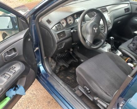 Синій Міцубісі Lancer, об'ємом двигуна 1.6 л та пробігом 220 тис. км за 4200 $, фото 6 на Automoto.ua